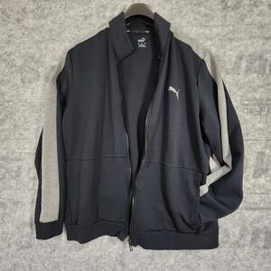 Puma hoodie Mens XL  black with logo on front and pattened on Sleeve flannel